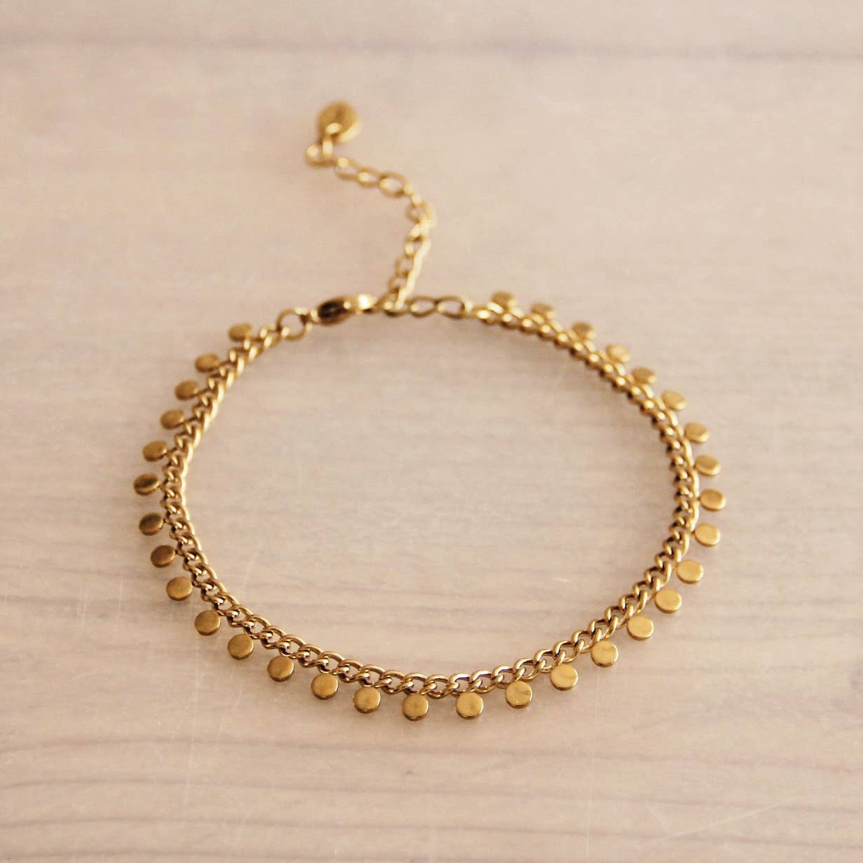 Steel chain bracelet with coins - gold