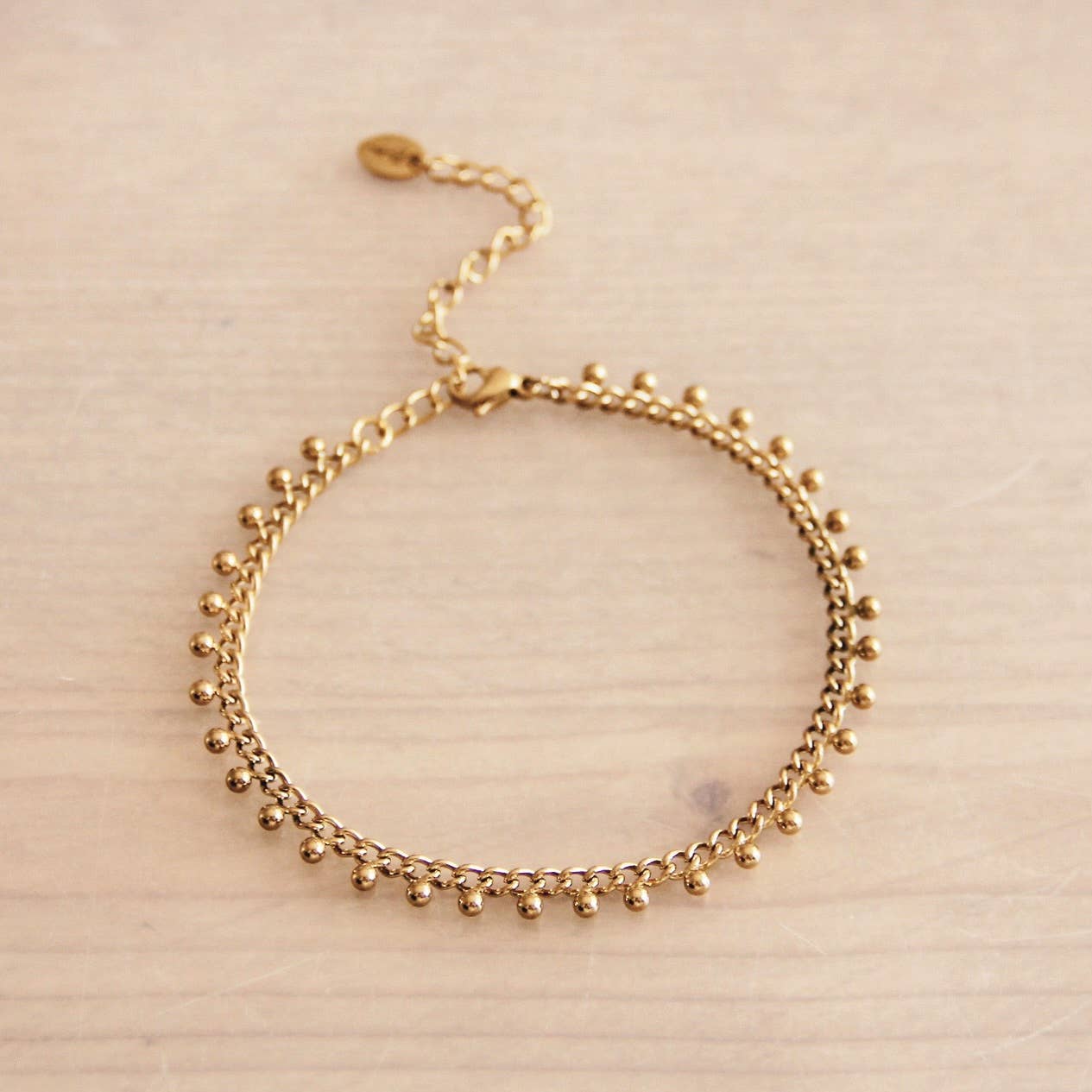 Steel chain bracelet with balls - gold